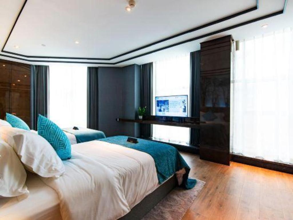 Xana Hotelle-Hotel Luzhou Baizitu Square Exterior foto