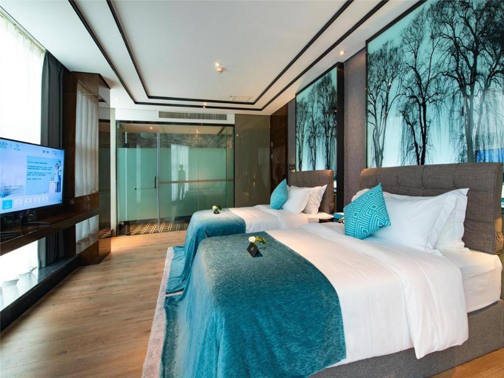 Xana Hotelle-Hotel Luzhou Baizitu Square Exterior foto