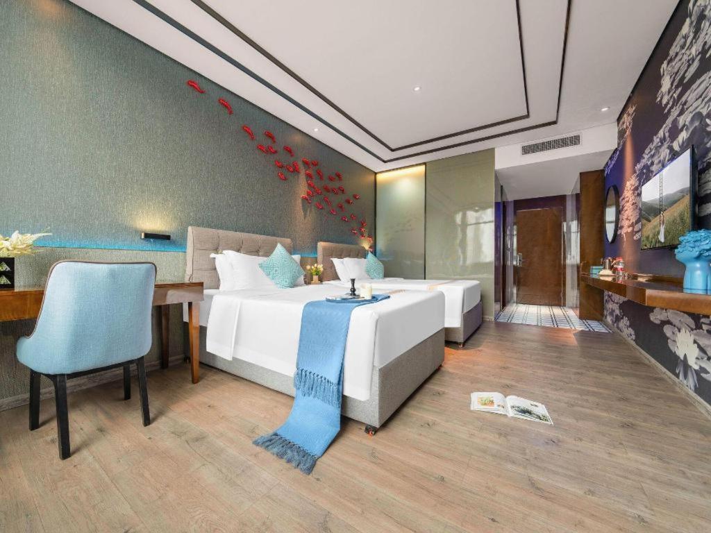 Xana Hotelle-Hotel Luzhou Baizitu Square Exterior foto